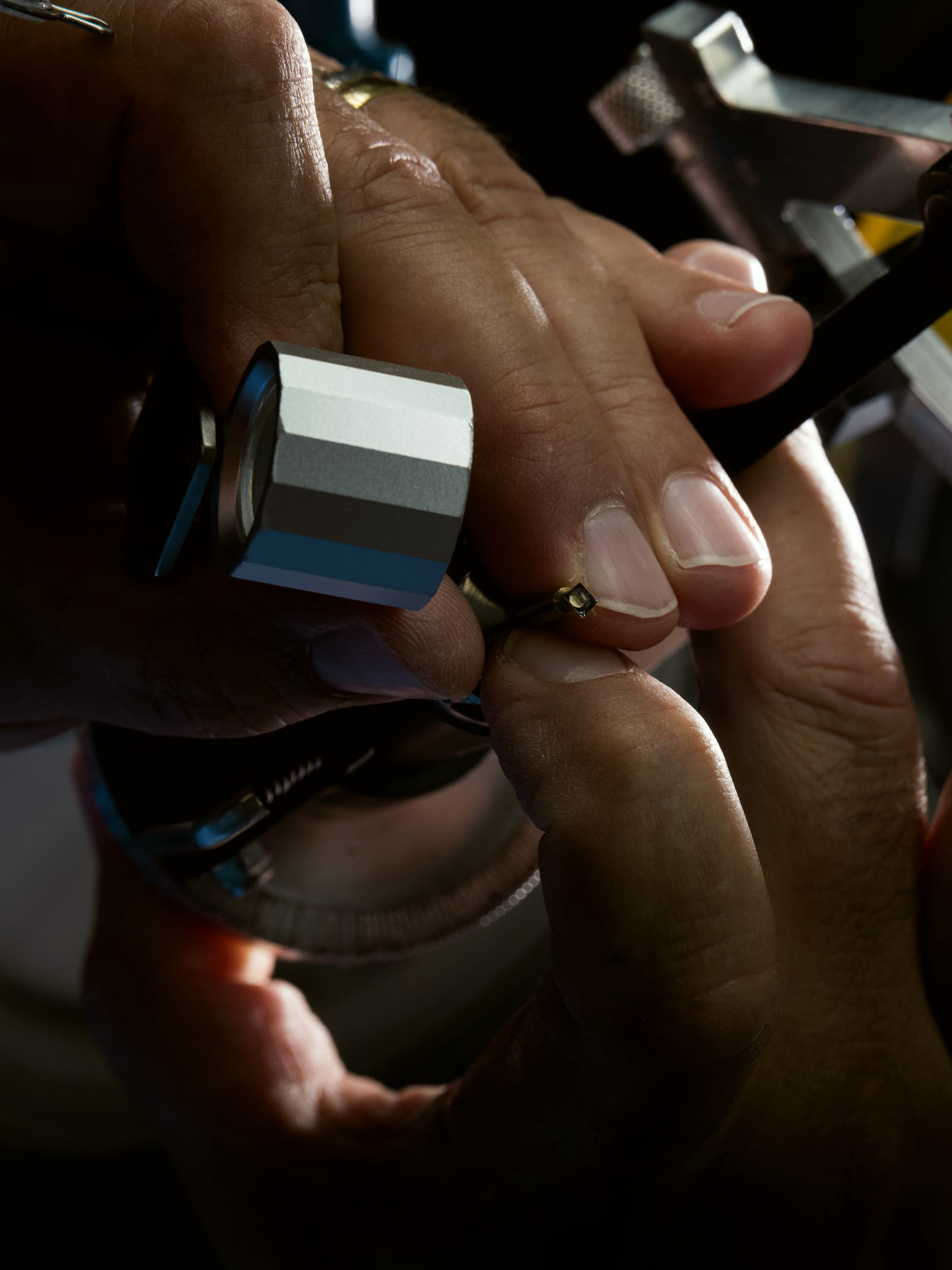 Hand-lapping a small watch component with a faceted lap