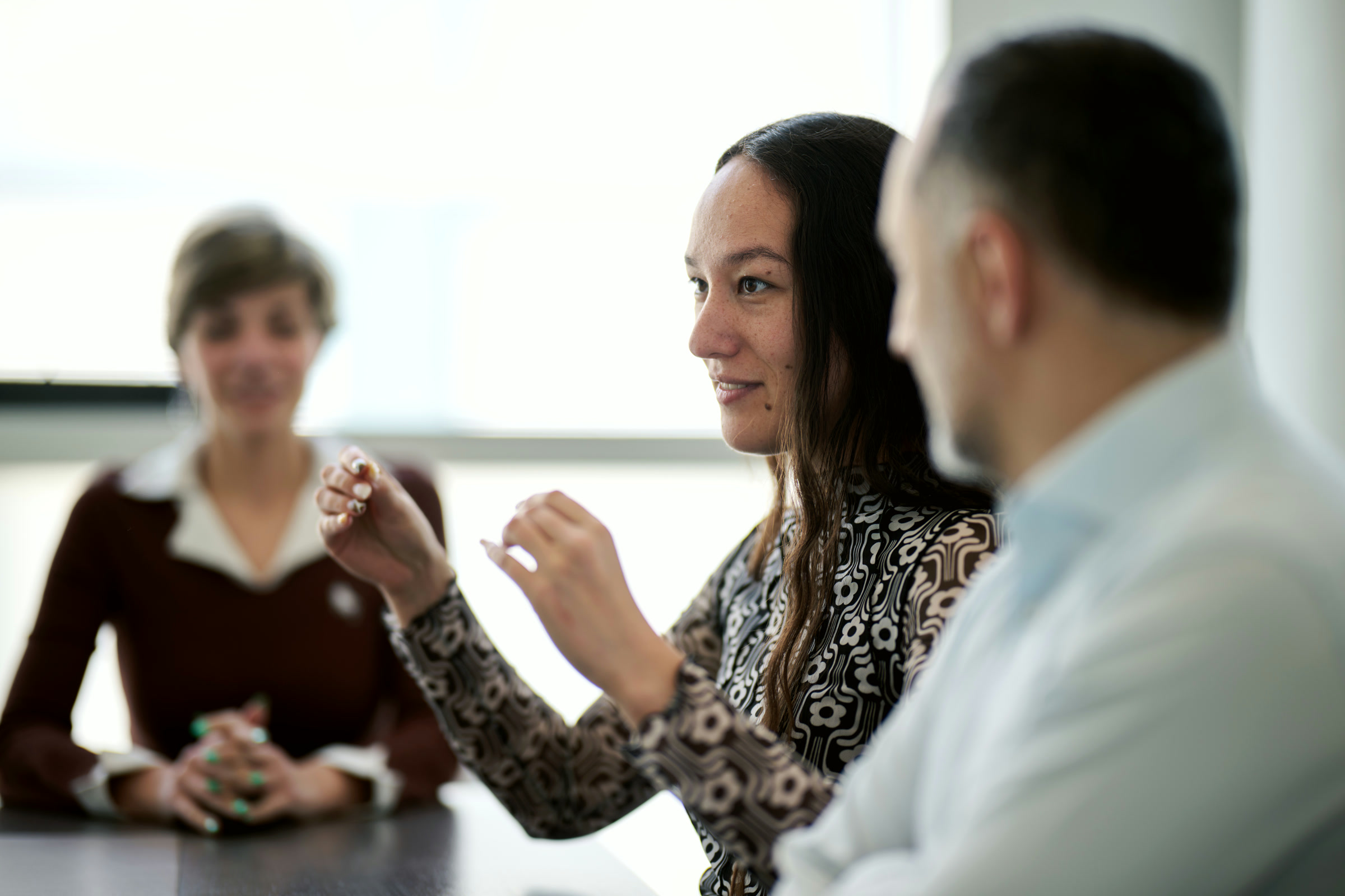 NIRU colleagues in conversation at the Geneva office