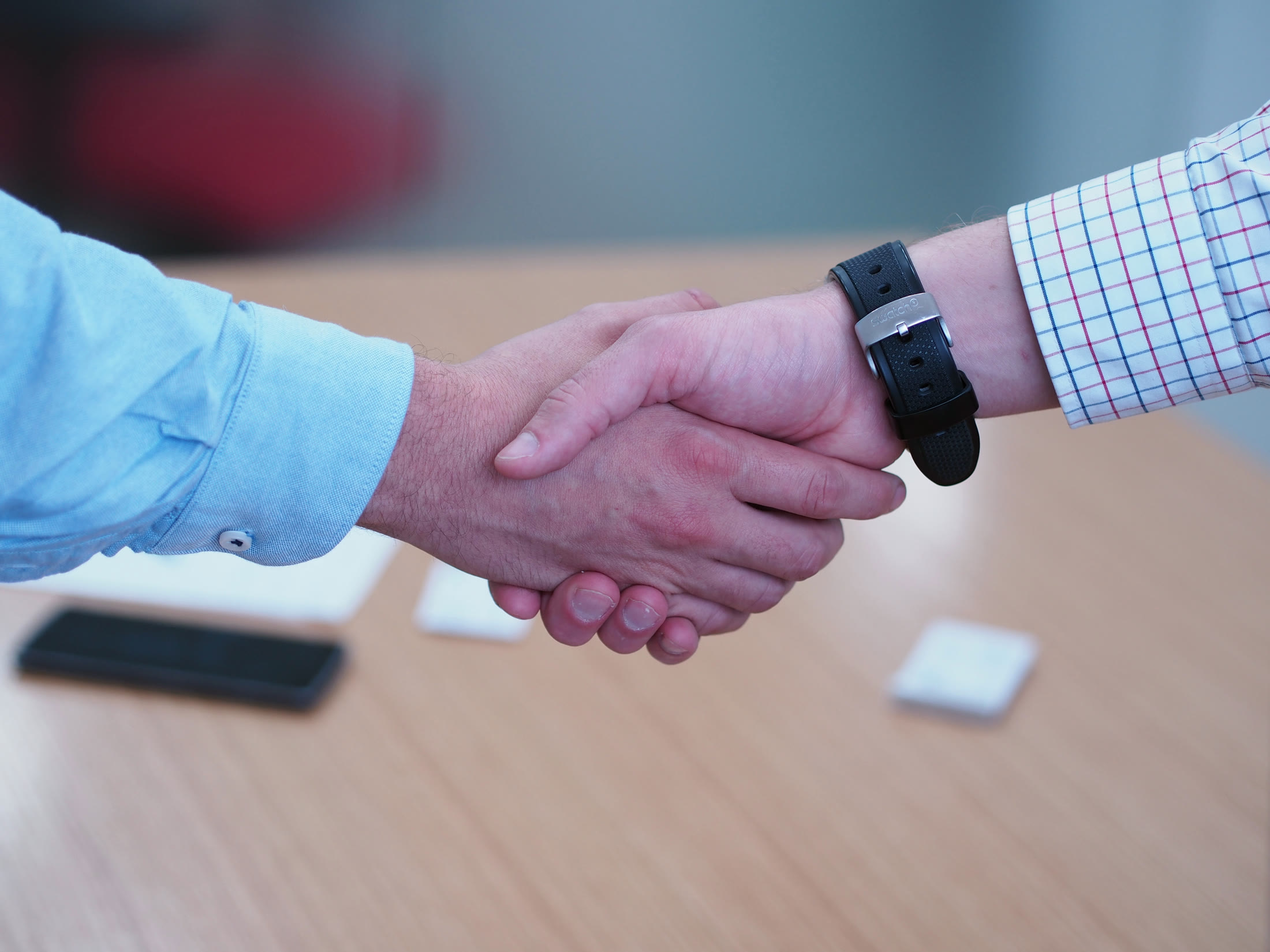 A handshake closing an agreement