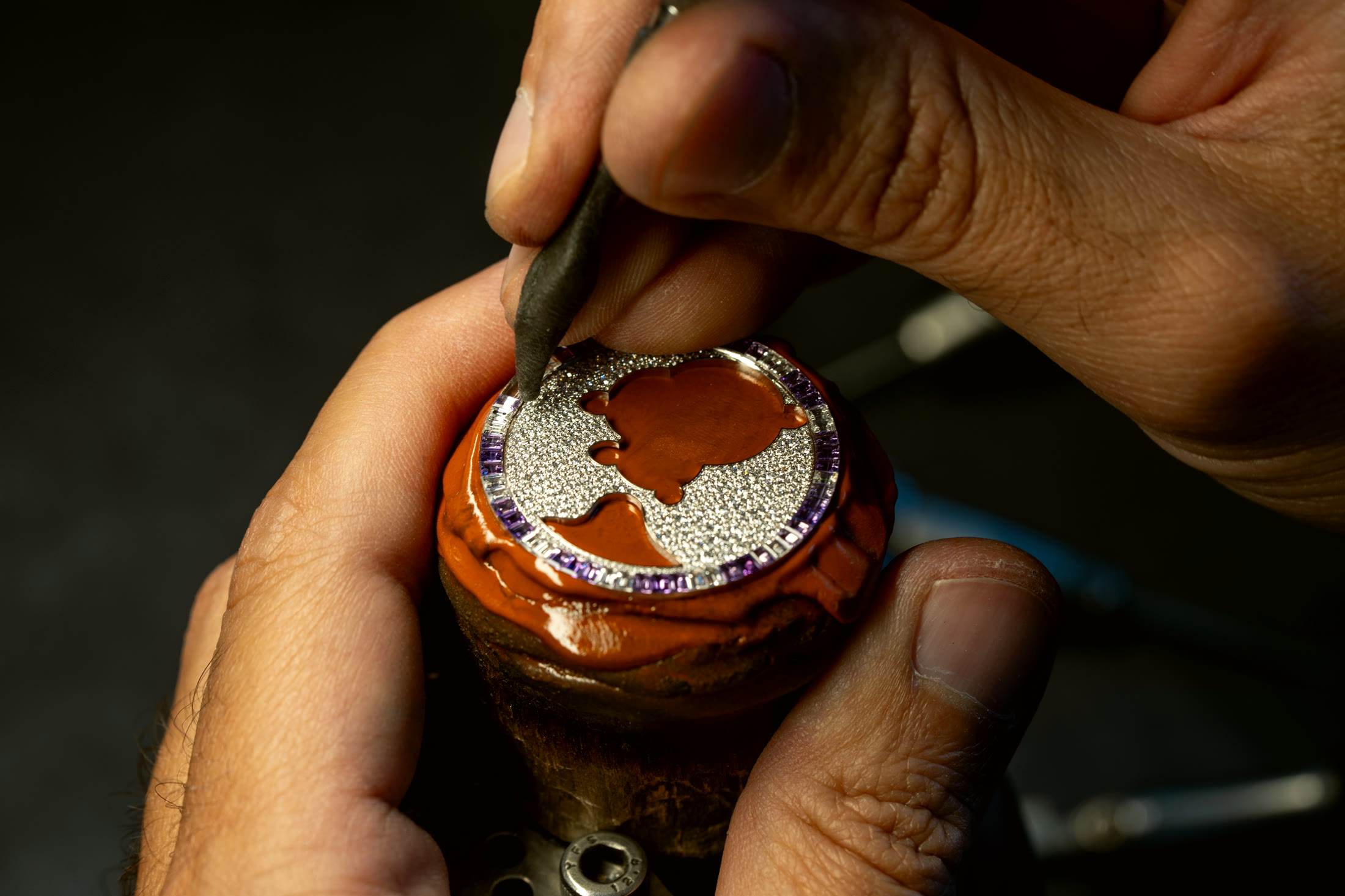 Finishing a piece at the Geneva facility