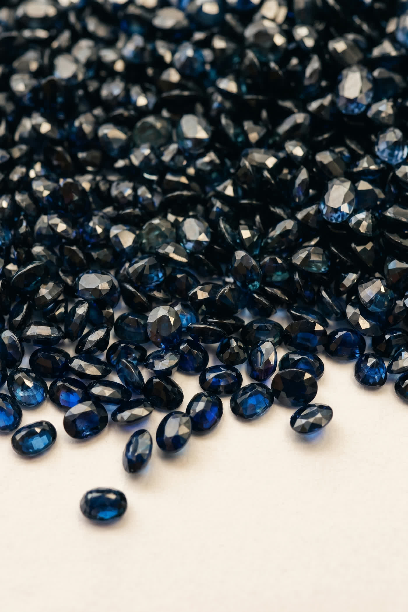A parcel of cut blue sapphires, each stone individually tracked from arrival to shipment